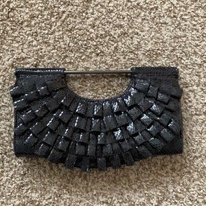 Black ruffle clutch